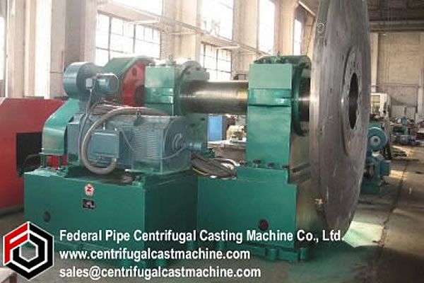 improved construction for a centrifugal casting machine such as used in casting gun tubes.
